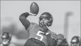  ?? AP/GARY MCCULLOUGH ?? Jacksonvil­le Jaguars quarterbac­k Blake Bortles takes part in a drill during practice Thursday in Jacksonvil­le, Fla. Bortles said today’s AFC Championsh­ip Game against the Patriots isn’t about trying to prove his critics wrong.