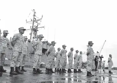  ??  ?? CREW members of the Philippine Navy BRP Emilio Jacinto arrive at the Davao port in Barangay Sasa on Saturday afternoon after participat­ing in the Philippine-Indonesia Coordinate­d Patrol activity in Manado, Indonesia last week. BING GONZALES