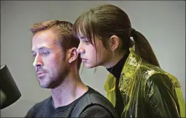  ?? CONTRIBUTE­D BY STEPHEN VAUGHAN/WARNER BROS. PICTURES ?? Ryan Gosling, left, and Ana de Armas star in “Blade Runner 2049.”