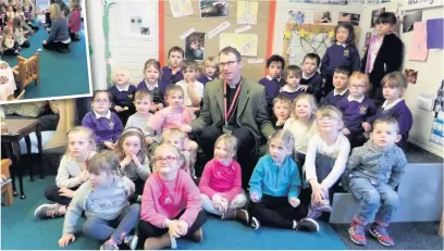  ??  ?? ● Bishop Philip North with the children at Little Saints Nursery School