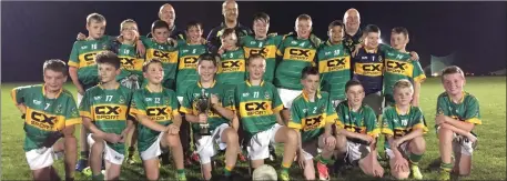  ??  ?? Cooley Kickhams celebrate their U-12 Division 1B title success.