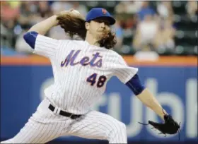 ?? FRANK FRANKLIN II — ASSOCIATED PRESS ?? Jacob deGrom delivers during Mets victory over Angels at Citi Field.