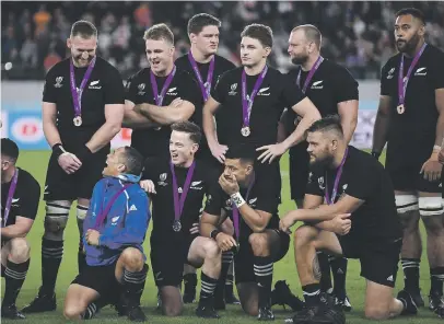  ?? Picture: AFP ?? FINISHING ON A HIGH. The All Blacks in high spirits after winning the Rugby World Cup bronze medal match by beating Wales at the Tokyo Stadium yesterday.