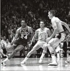  ?? AP 1968 ?? The Celtics’ Sam Jones drives past the Lakers’ Jerry West (44) to the basket in a playoff game in Los Angeles on May 2, 1968. Jones, a Hall of Famer who won 10 NBA titles — second only to teammate Bill Russell, died Thursday at the age of 88.