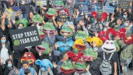  ??  ?? Pro-democracy protesters take part in a march in Hong Kong on Sunday.
AP