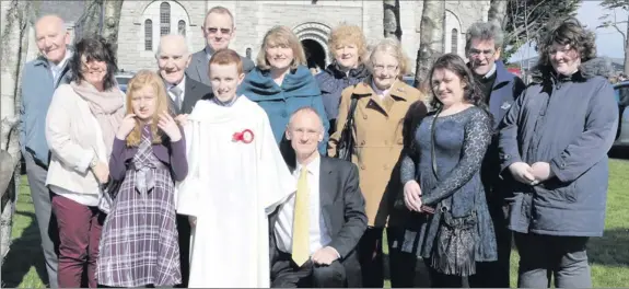  ??  ?? Sean Ashworth pictured with his family on the occasion of his Confirmati­on at St. Anne’s Church, Shankill.