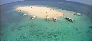  ??  ?? NAKED Island may be pristine but on our way, we saw empty mineral bottles drifting in the sea