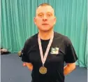  ??  ?? Prize Steven Lafferty wins gold at the British Masters competitio­n