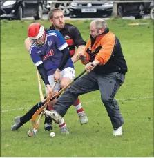  ?? Photograph: Kevin McGlynn. ?? Cruachansi­de keeper George Reid moves in to stop Martin MacFadyen, Kyles.