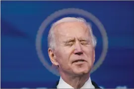  ?? The Associated Press ?? President-elect Joe Biden speaks at The Queen theatre in Wilmington, Del., Wednesday. Biden called violent protests on the U.S. Capitol “an assault on the most sacred of American undertakin­gs: the doing of the people’s business.”