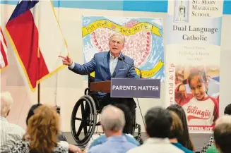  ?? Robin Jerstad/Staff photograph­er ?? Gov. Greg Abbott has been visiting religious schools, including St. Mary Magdalen School in San Antonio, to build support for his voucher program.