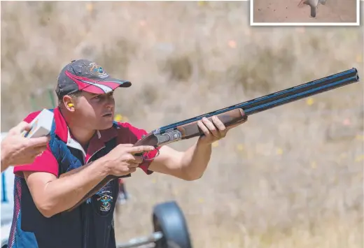  ??  ?? NT Field and Game member, Ricky Crawford finds the target in the shoot off to win A Grade at the Field and Game National Championsh­ip