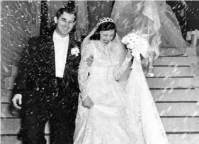  ?? Sam Bain ?? Sam and Rose Bain on their wedding day, Oct. 25, 1952.