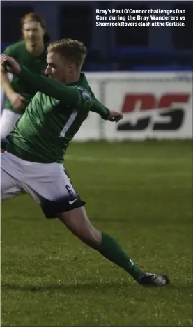  ??  ?? Bray’s Paul O’Connor challenges Dan Carr during the Bray Wanderers vs Shamrock Rovers clash at the Carlisle.