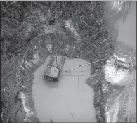  ?? For the Washington Post/DOMINIC BRACCO II/Prime ?? A dredging operation carves out a foul swath in the Amazon forest in Peru’s Tambopata nature reserve.