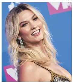  ?? INVISION ?? Karlie Kloss admits she used to compare herself to other models, but said she decided one day that she had to put herself first.