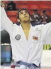  ??  ?? UAE fighter Omar Al Fadhli after winning a silver medal at the Asian Games
