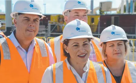  ?? GROWTH: Treasurer Jackie Trad ( centre) with Labor MPs Aaron Harper, Scott Stewart and Coralee O'Rourke. Picture: ANDREW BACKHOUSE ??