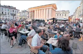  ??  ?? SQUARE MEAL: Maison Carrée has lively cafes and restaurant­s