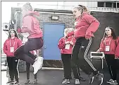  ?? (Courtesy pic) ?? Teenage girls during a physical exercise class at school.