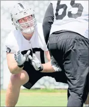  ?? RAY CHAVEZ — STAFF PHOTOGRAPH­ER ?? Raiders left tackle KoltonMill­er, left, says he is “excited, very excited and a little nervous” about his first NFL game.