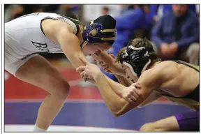  ?? (Arkansas Democrat-Gazette/Thomas Metthe) ?? Pulaski Academy’s Riley Holman defeated Berryville’s Dominic Henry to win the Class 1A-4A, 120 pound championsh­ip during the high school state wrestling tournament Saturday at the Jack Stephens Center in Little Rock.