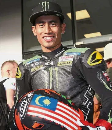  ?? — Bernama ?? Cool rider: Even with his first MotoGP qualifying effort taking place under floodlight­s, Hafizh Syahrin did not buckle under pressure.