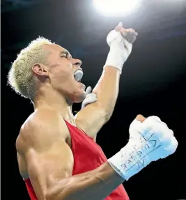  ??  ?? David Nyika reacts after winning his 91kg heavyweigh­t final.