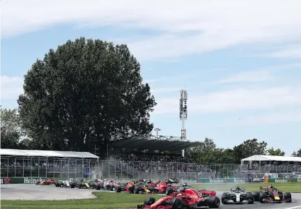  ?? CHARLES COATES/GETTY IMAGES ?? No shocker: Sebastian Vettel led the field at the start of the Canadian GP on Sunday and cruised to a victory from there.