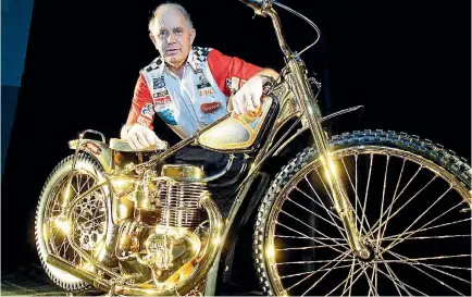  ??  ?? Ivan Mauger with his million-dollar gold-plated speedway motorcycle that now lives at Canterbury Museum.