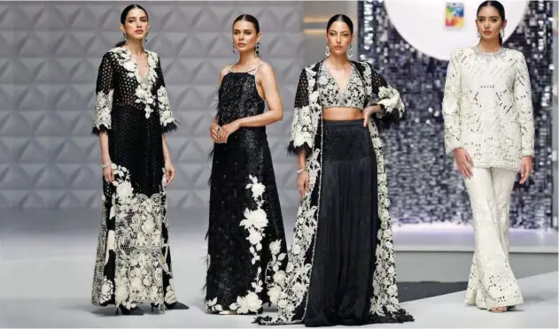  ?? Agence France-presse ?? Models present creations by Pakistani ↑ designer Sana Safinaz during a fashion show organised by The Trade Developmen­t Authority of Pakistan in Karachi on Friday.