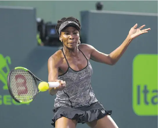 ?? — GETTY IMAGES ?? Venus Williams plays a shot during her victory over top seed Angelique Kerber at the Miami Open.