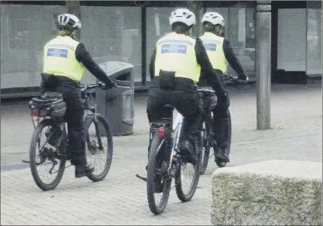  ??  ?? ‘OPERATIONA­L REASONS’
PCSOs on bikes in Commercial Road/Arundel Street in Portsmouth city centre on March 22