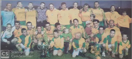  ??  ?? The victorious Rathnew team and supporters after their win over Wicklow Town that earned them their fourth Wicklow Cup on the trot.