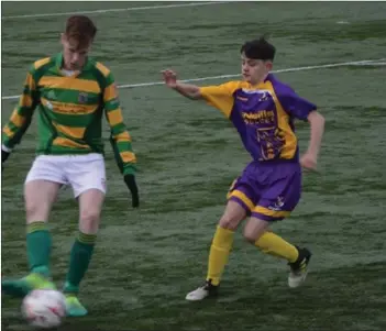  ??  ?? Jamie Dawson of Wexford C.B.S. pressing the ball.