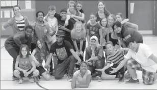  ??  ?? Westview students in Grades 6, 7, and 8 have a great day learning hip hop from Taylor and Bowerman.