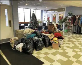  ?? RECORD FILE PHOTO ?? In this file photo, the lobby of the Cohoes Community Center was filled with donations for those impacted by the fire. Cohoes officials say they are trying to make sure the funds raised get to the victims.