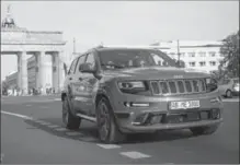  ?? MAGNA INTERNATIO­NAL INC. ?? A Jeep Grand Cherokee fitted with Magna Internatio­nal’s MAX4 self-driving technology is seen near the Brandenbur­g gate in Berlin.