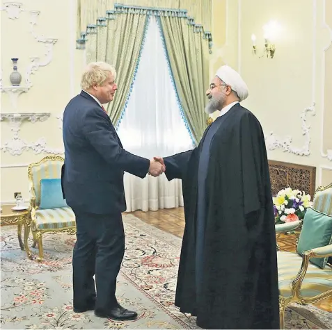  ??  ?? Boris Johnson, the Foreign Secretary, met with Hassan Rouhani, the Iranian president, in Tehran yesterday. He raised the case of Nazanin Zaghari-ratcliffe, the jailed aid worker