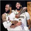  ?? / Los Angelestim­es /TNS ?? Wally Skalij
Los Angeles Lakers Lebron James (left) and Anthony Davis celebrate as the Lakers win the NBA Championsh­ip in Game 6 on Sunday, Oct. 11, 2020.