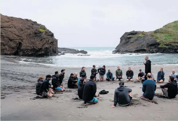  ?? ?? The Calm Under Pressure workshop in Piha takes a break on the sand.