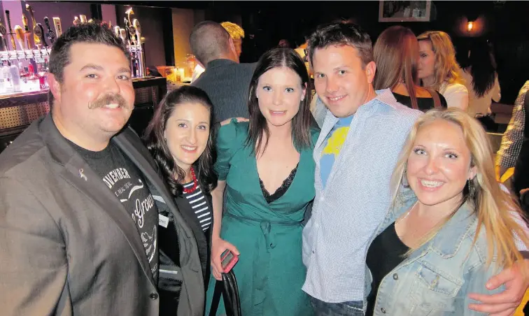  ?? Photos: Caroline Gault/ Edmonton Journal ?? From left, Movember Canada’s Mike Miller, Mo’ Sista Crystal DeCosta and Kate Tonowski, Movember Canada’s Ryan Branting, and Mo’ Sista Meredith Bongers at the Movember launch party at MKT.