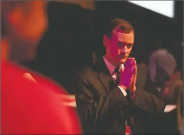  ?? The Associated Press ?? BEHIND THE STAGE: In this Saturday, June 2 file photo, minutes after receiving the Republican Party endorsemen­t for governor, Jeff Johnson pauses behind the stage, in Duluth, Minn. Johnson has been supportive of President Donald Trump.