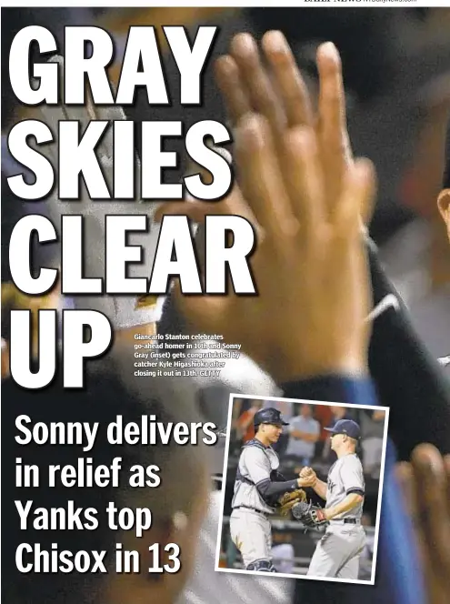  ?? GETTY ?? Giancarlo Stanton celebrates go-ahead homer in 10th and Sonny Gray (inset) gets congratula­ted by catcher Kyle Higashioka after closing it out in 13th.