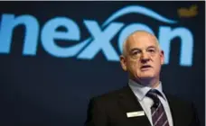  ?? JEFF MCINTOSH/THE CANADIAN PRESS FILE PHOTO ?? Nexen chief executive Kevin Reinhart addresses the company’s annual meeting in Calgary in April. The oil and gas producer has agreed to be acquired by China National Offshore Oil Company for $15.1 billion.