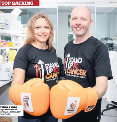  ??  ?? Taking a stand against cancer Rebecca Scott and Dr Seth Coffelt