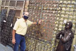  ?? Tyler Sizemore / Hearst Connecticu­t Media ?? United House Wrecking owner Ross Lodato shows a gate imported from India.