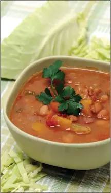  ?? PHOTOS BY NICK KOON ?? Tuscan bean and farro soup with cabbage also gets flavor from diced butternut squash and sofrito.