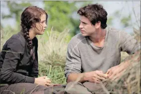  ?? ALLIANCE ?? The popularity of The Hunger Games, starring Jennifer Lawrence as Katniss Everdeen and Liam Hemsworth as Gale Hawthorne, has fans already asking: What’s next?