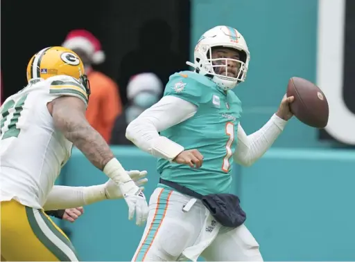  ?? JIM RASSOL/AP ?? Dolphins quarterbac­k Tua Tagovailoa remains in the NFL’s concussion protocol more than a month after getting hurt Dec. 25 against the Packers.